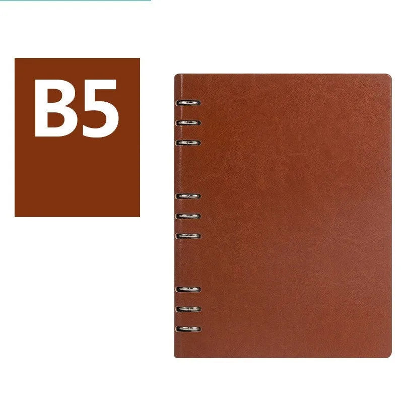 Loose-leaf business notebook in seaweed green imitation leather cover showing A5 size with beige paper