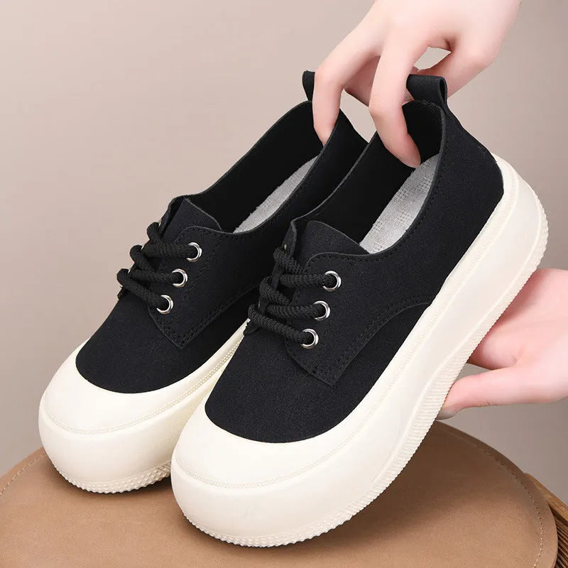 Women's camel suede platform loafers with round toe, flat heel, and front lace-up.
