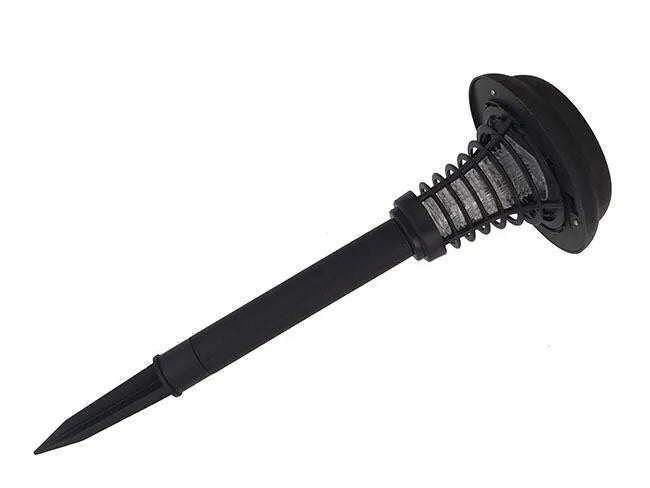 Black solar powered insect killing mosquito lawn lamp with white and purple light LEDs in a garden setting.