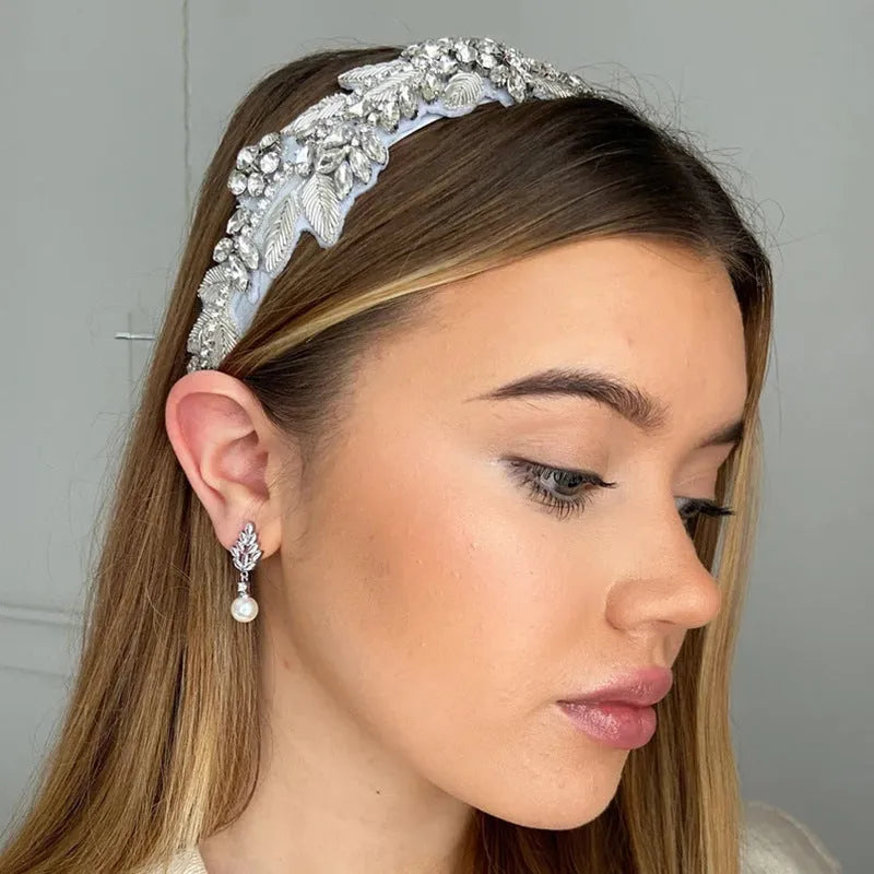 Geometric drop earrings with pearl and micro inlaid zircon, available in gold, platinum, and rose gold plating.