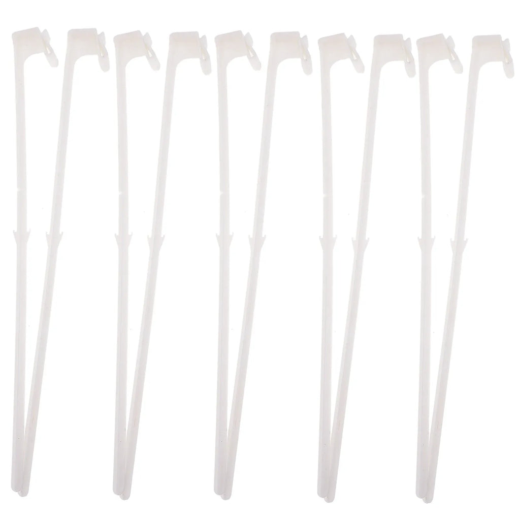 Ten white PP plastic car window flag pole holder clips laid out.