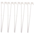 Ten white PP plastic car window flag pole holder clips laid out.