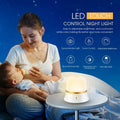 White bedside nursing night light with touch controls for dimming and colour adjustment