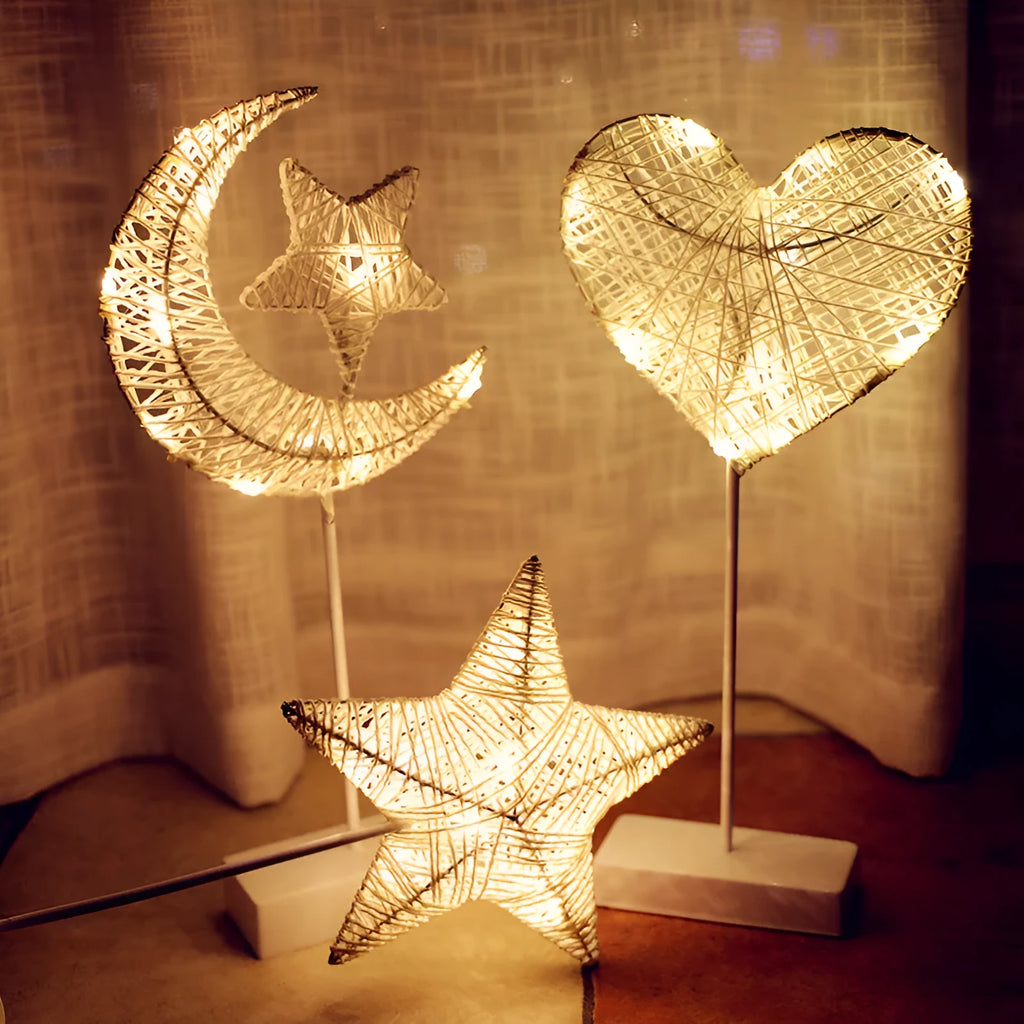 Rattan woven LED decorative table lamp in star, heart, or moon shape with copper wire frame and battery operation