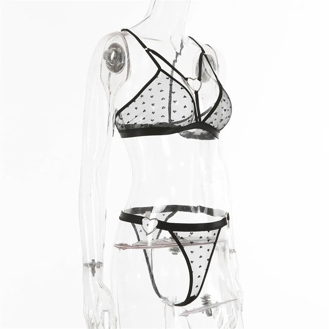 Women's black mesh spandex two-piece set with crop top and leggings.