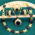 Gold plated jewellery set with multi-colour cubic zirconia stones, showing necklace, earrings, ring, and bracelet.
