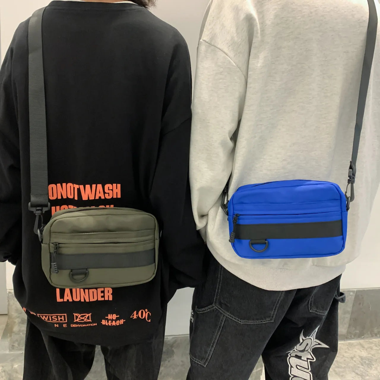 Men's nylon messenger bag in black, blue, green, or white with crossbody strap and street style design