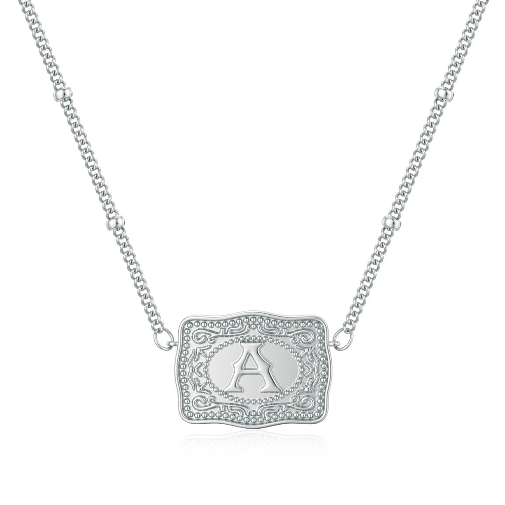 Copper electroplated necklace with a letter charm, available in gold or white k colour.