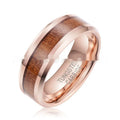 8mm wide U-shaped Ugyen men's ring in rose gold or steel colour on a plain background.