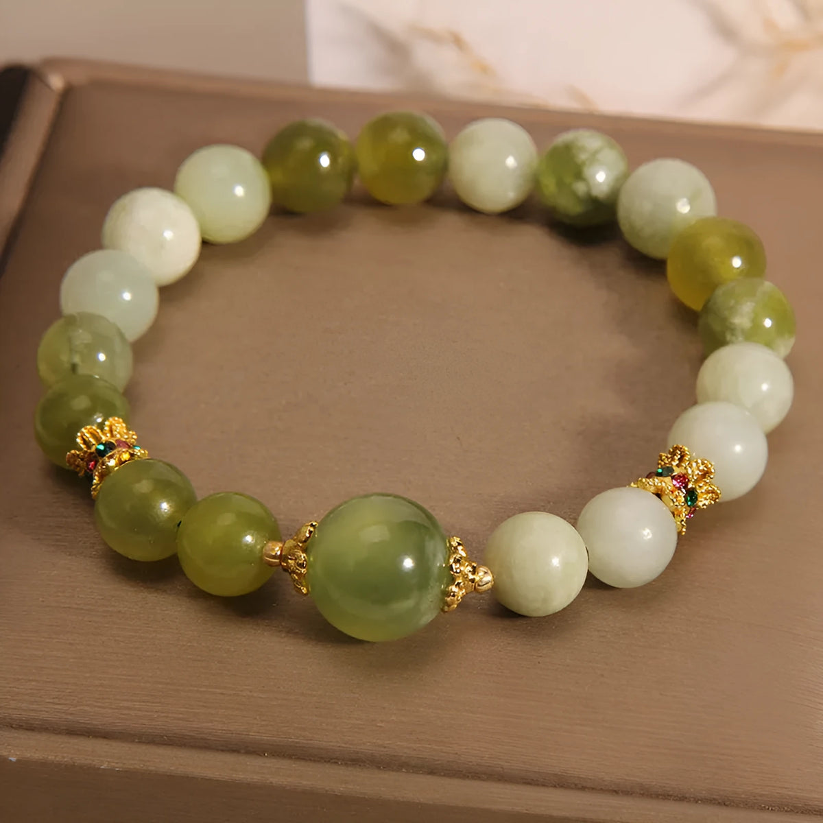 Xiuyan jade green women's bracelet with original design on wrist