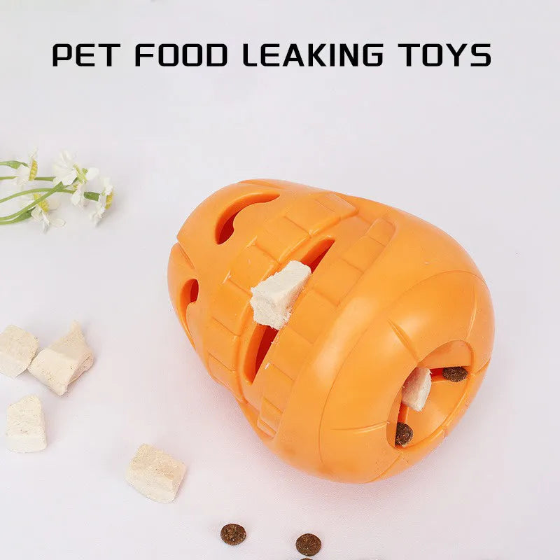 Orange Halloween pumpkin shaped dog chew toy with a treat-dispensing funnel opening.