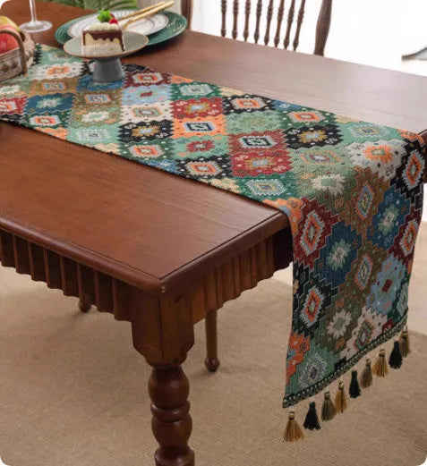 European retro cotton linen style table flag with handwoven tassels in blue ginkgo leaves pattern on sideboard