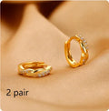 Women's geometric interwoven hemp rope earrings in gold or silver with copper construction