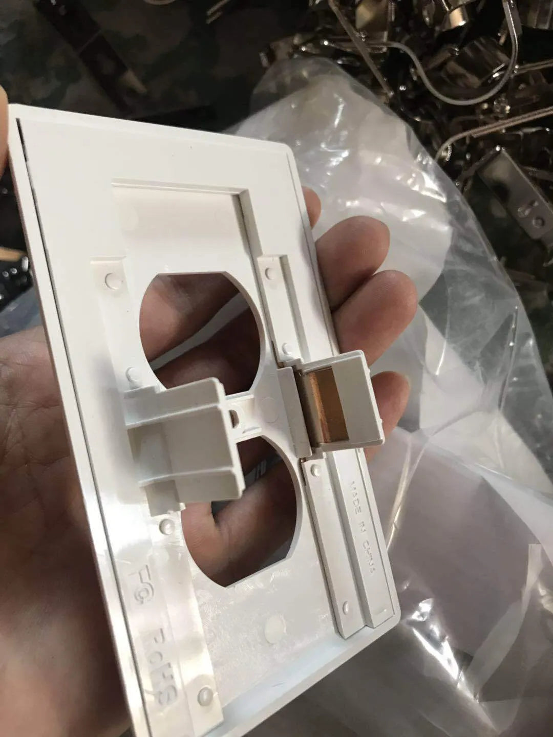 White plug-in socket induction night light with automatic sensor for walls.