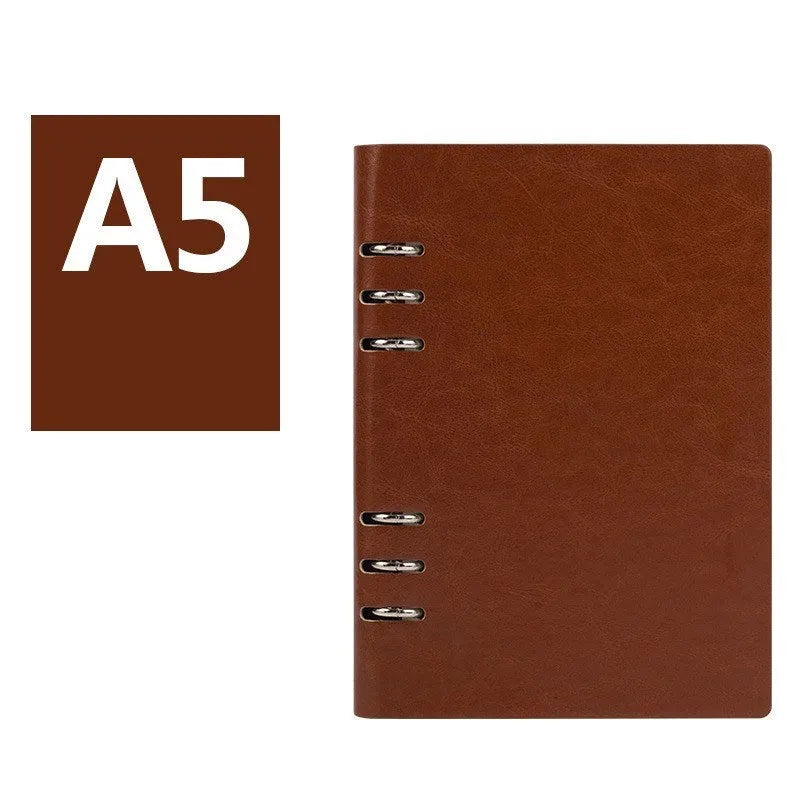 Loose-leaf business notebook in seaweed green imitation leather cover showing A5 size with beige paper