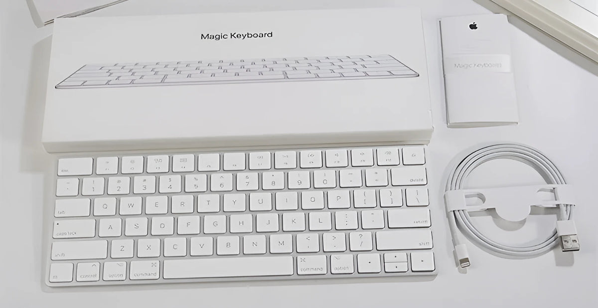 Apple Bluetooth wireless keyboard with white finish and ultra-thin metal casing