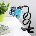 Black portable phone holder with long flexible arm and V-type clip on a desk