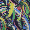 Blue cotton fabric with digital print of plants and flowers, showing 145cm width.