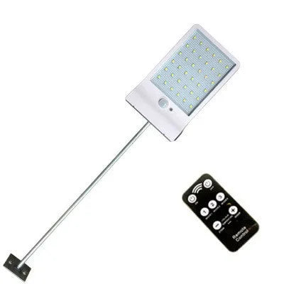 Black and white waterproof solar garden light with LED illumination for outdoor use