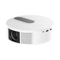 White HD home projector with remote control on a table