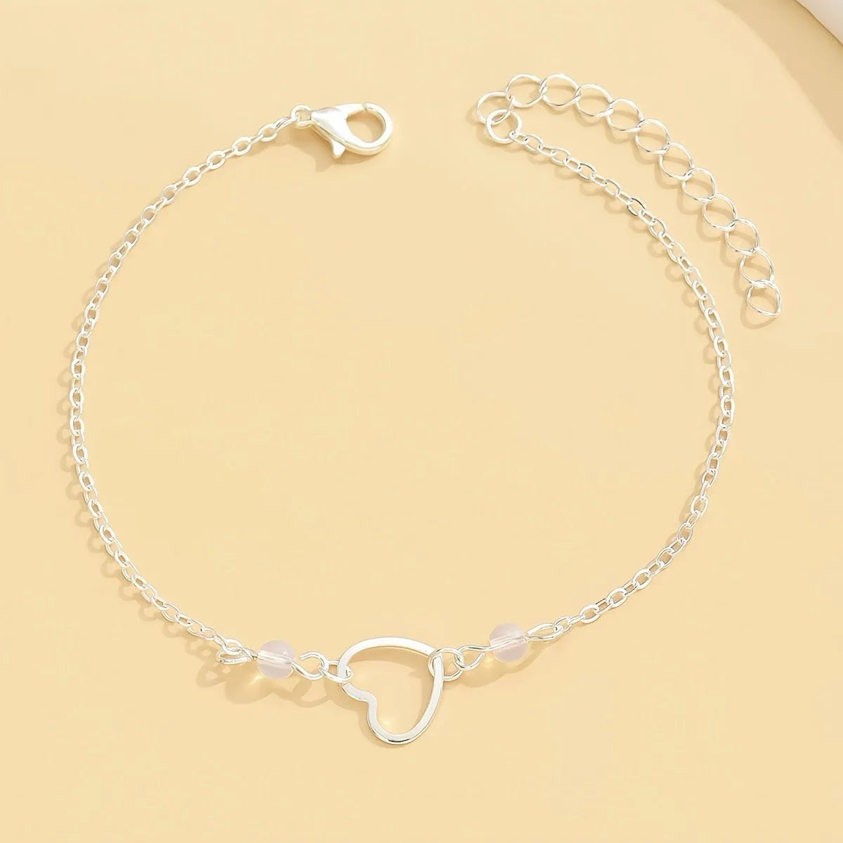 Adjustable women's anklet with heart-shaped pendant in gold or silver geometric jewellery