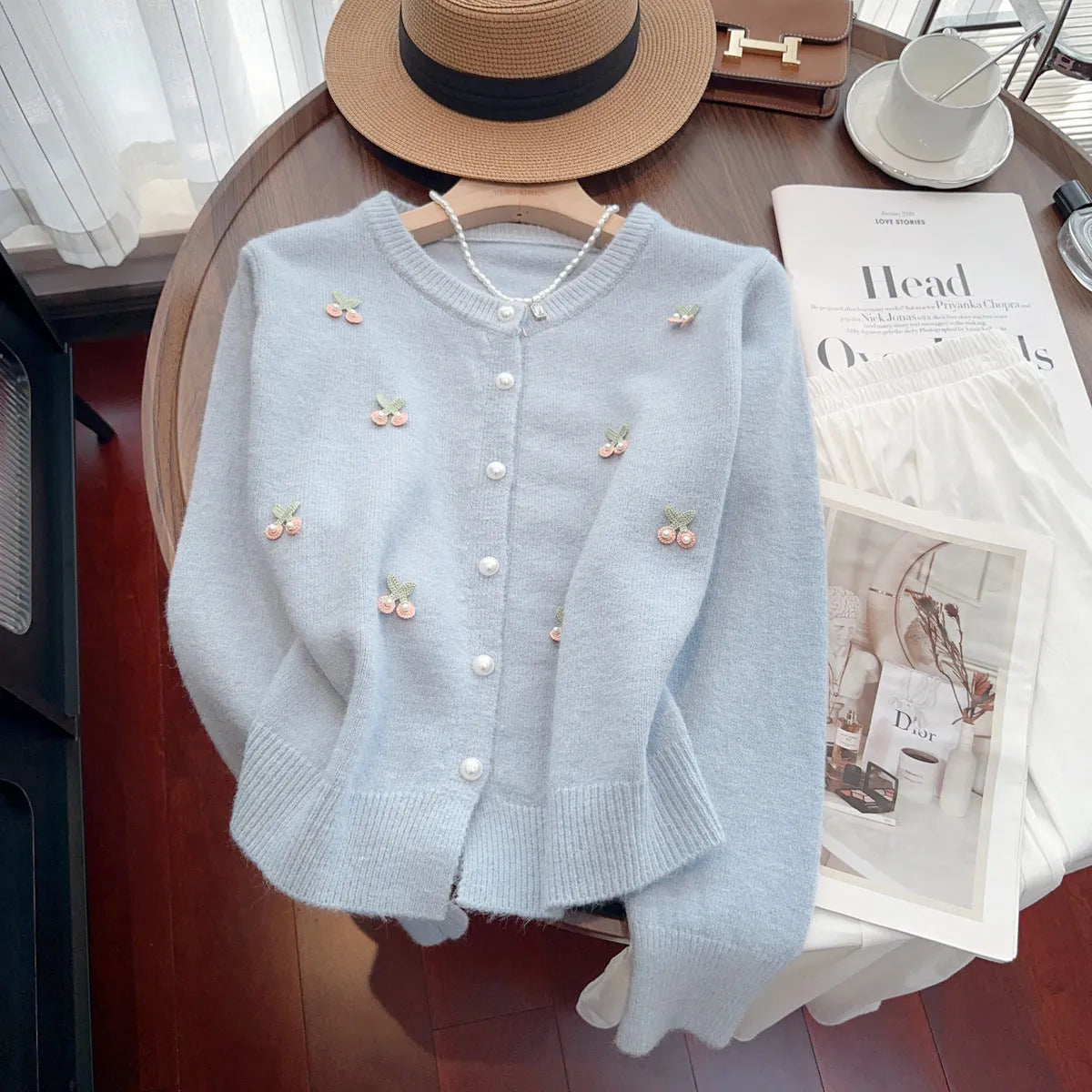 Women's slim fit cashmere-feel cardigan with beaded detail on sleeve, in blue colour.