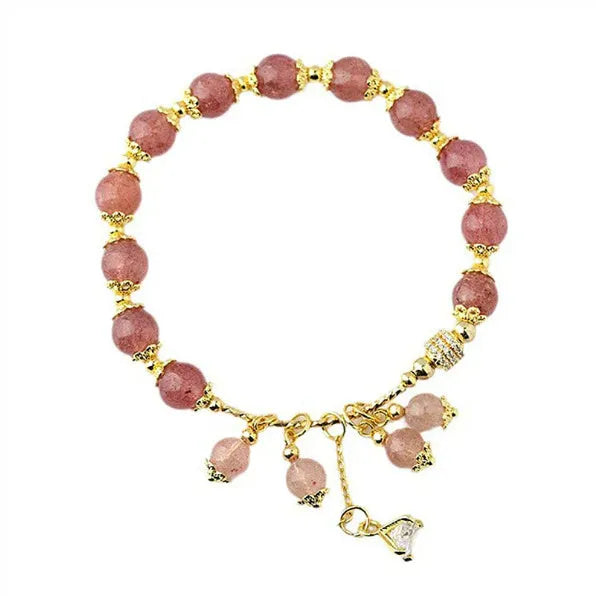Pink women's crystal bracelet with heart-shaped charms and pearl decorative accents