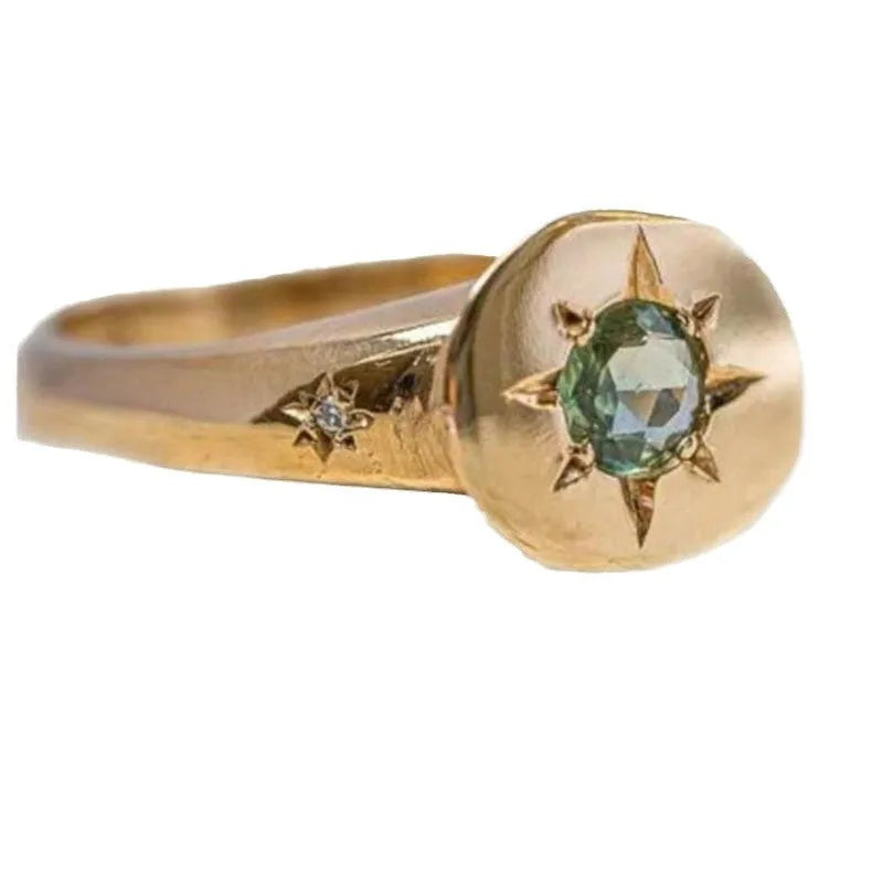 Golden adjustable ring with oval asterism zircon and star micro inlay design