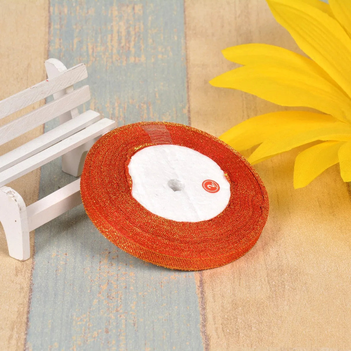 Green onion patterned polyester ribbon on spool, 3 points width, for clothing and gift box use.