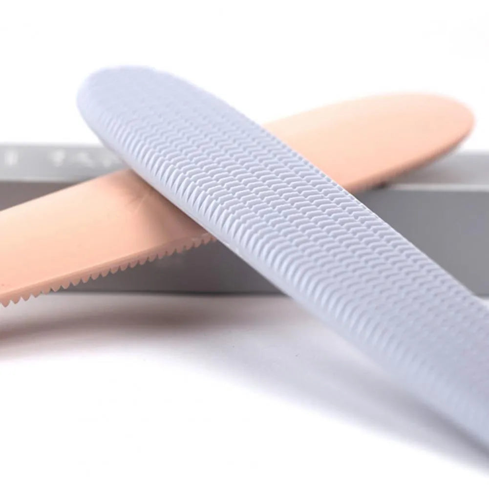 Grey ABS plastic cat comb with tongue massager design showing narrow and wide ends for pet grooming