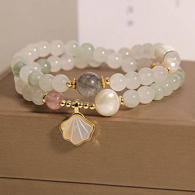 Crystal bracelet with Tianshan jade ginkgo leaf pendant, gold-plated inlay, and rhinestone details