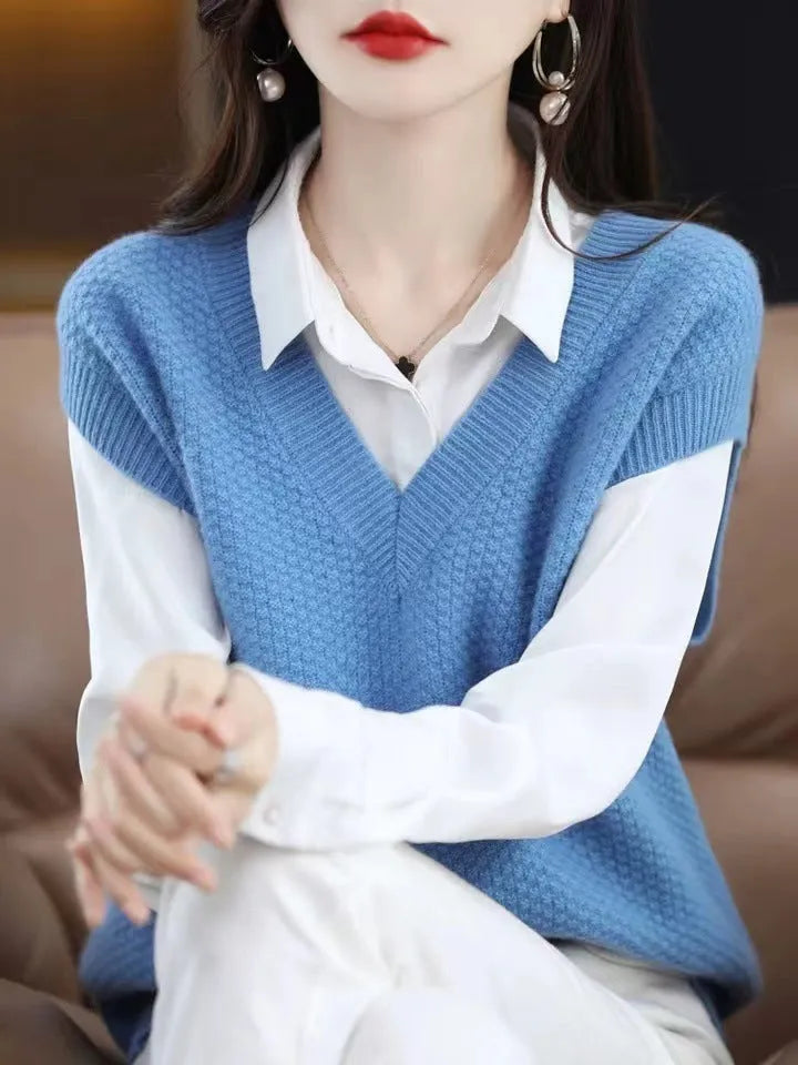 Women's cream V-neck sleeveless knit vest with a raised 3D pattern, laid flat.