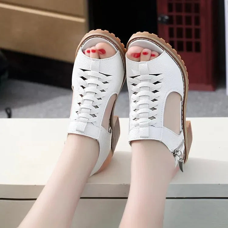 Women's black retro sandals with a side zipper and a mid-height heel.