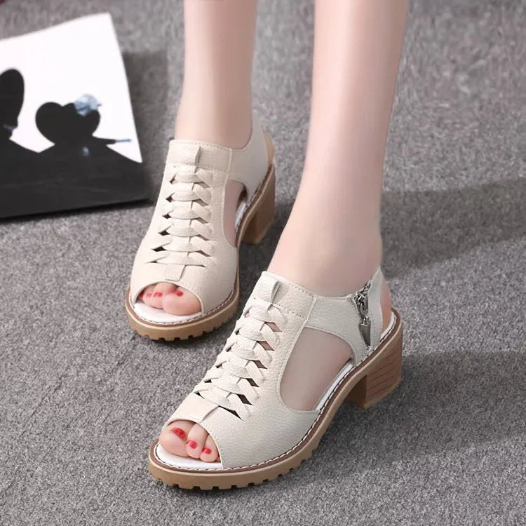 Women's black retro sandals with a side zipper and a mid-height heel.