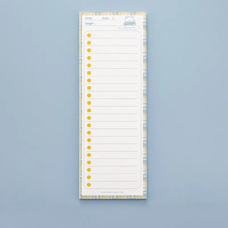 Cartoon student notepad in plastic storage box showing colourful striped and bear designs