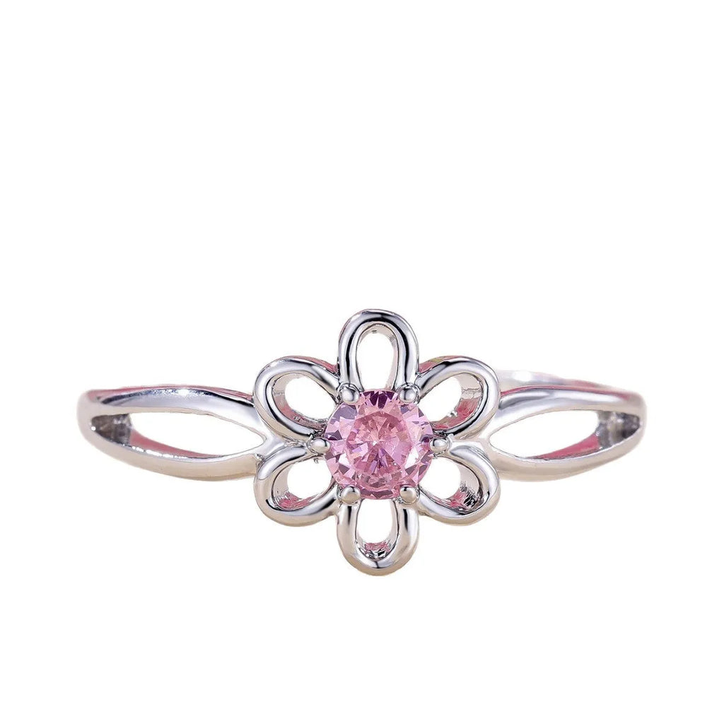 Women's flower hollow fashion ring in copper with electroplated metallic finish