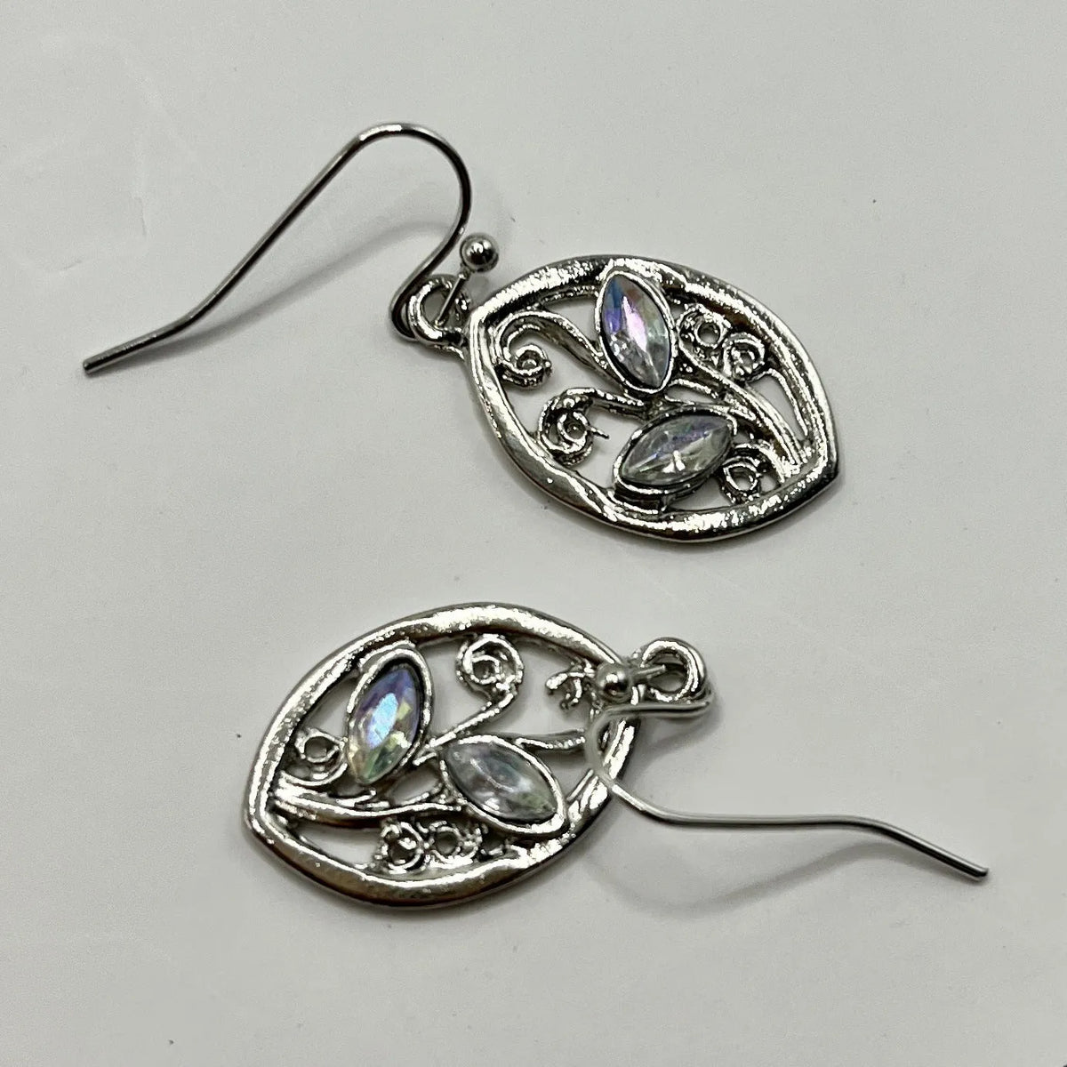 Silver leaf-shaped earrings with embedded colourful moonstone stones for women