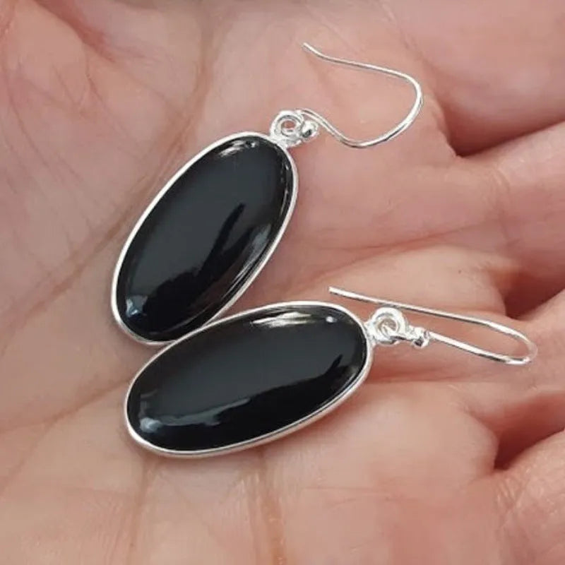 Women's earrings with oval black agate pendant and electroplated 925 silver geometric setting