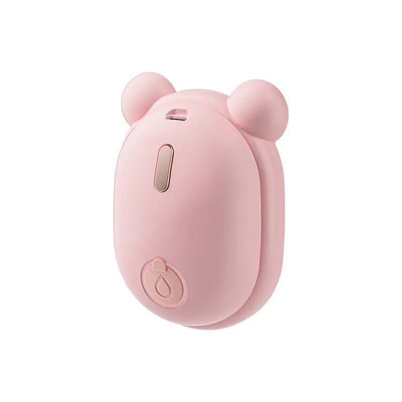 Pink and yellow rechargeable 3-in-1 pet grooming comb with spray function and massage teeth.