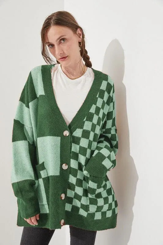 A woman's loose slim fit cardigan in a polyester-spandex knit fabric, shown in one of six available colours.