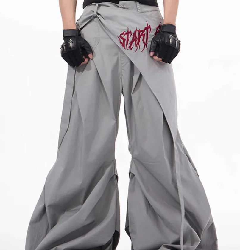Boy wearing black wide-leg trousers in a refined Korean style, showcasing a casual and trendy look.