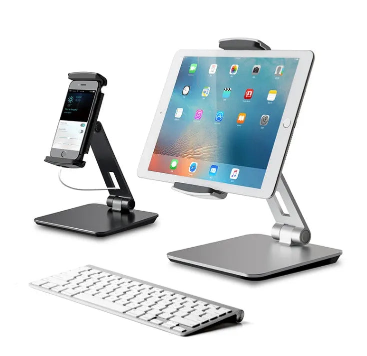 Foldable aluminium desktop phone and tablet holder in silver showing 360-degree rotation