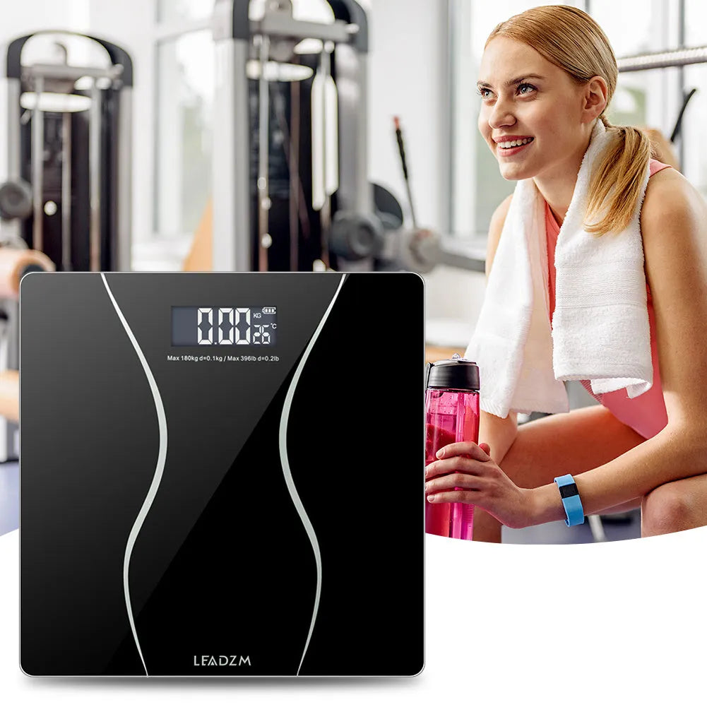 Black electronic body scale with digital LCD display for weight measurement up to 180kg