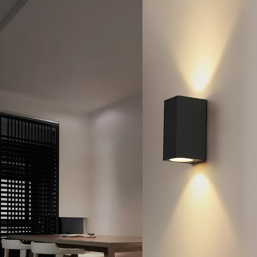 Black aluminium wall lamp with silicone rubber trim and glass elements