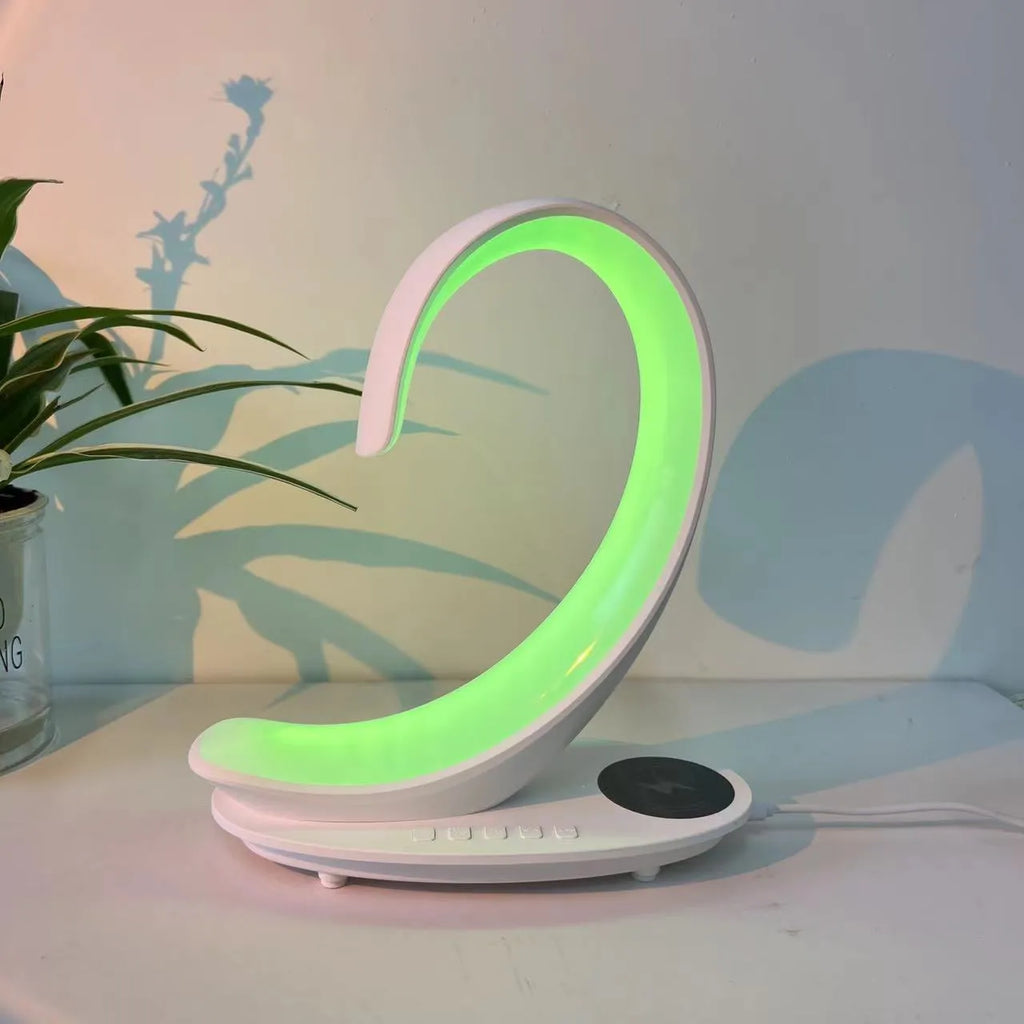 White swan desktop wireless charger with Bluetooth speaker and colourful atmospheric lighting