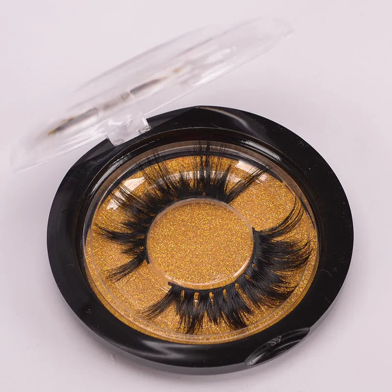 5D mink false eyelashes with protective hair cap and double-headed brush on white background