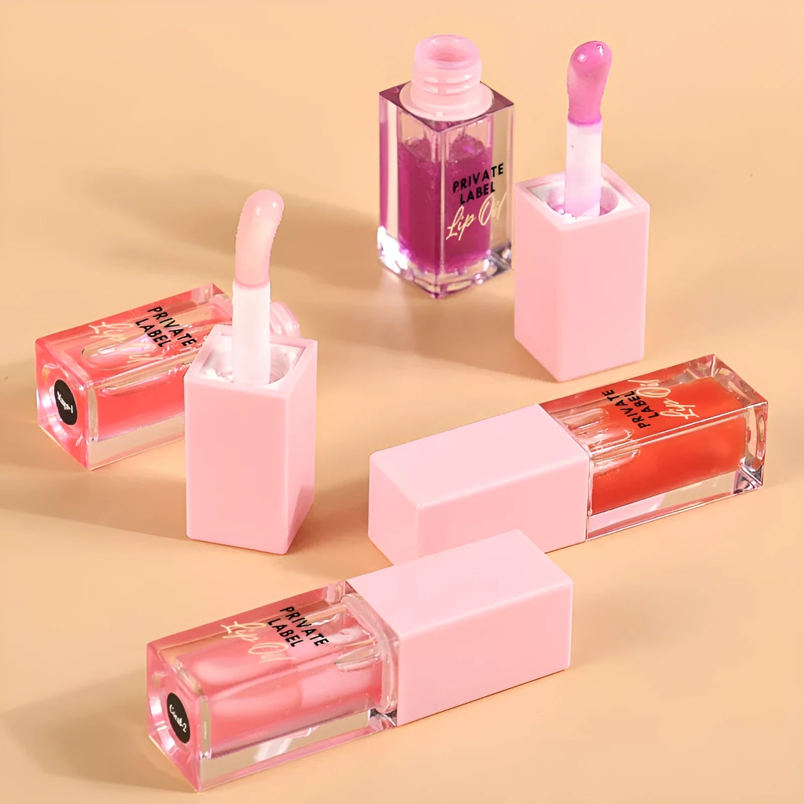 Six transparent lip gloss tubes in bird of paradise, cherry, coral, mango, strawberry, watermelon shades