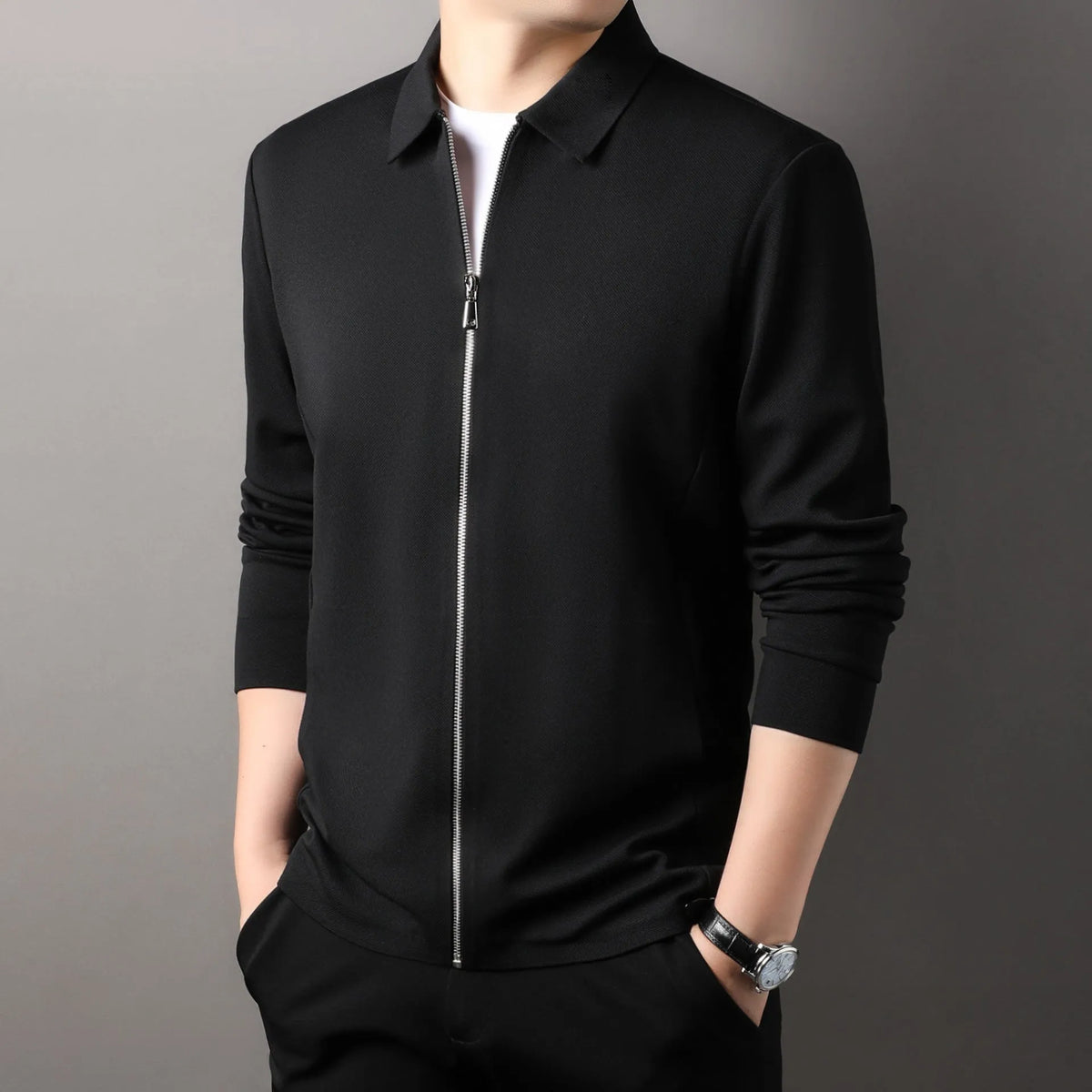 Men's polyester casual business jacket in black, straight hem, long sleeves, shown on a model.