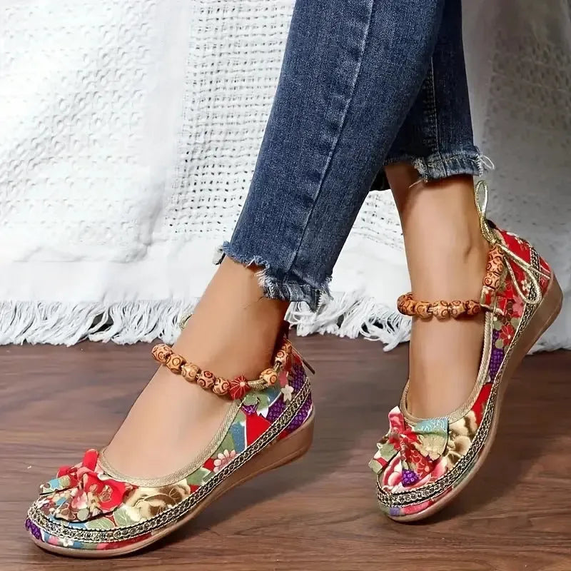 Women's black ethnic style platform sandals with cloth upper and elastic band, plus size range.