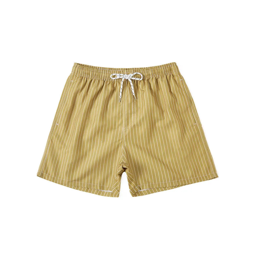 Man or woman wearing striped polyester shorts in navy blue, straight leg style, for beachwear.